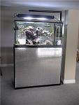 90g tank $300 
custom built stand $400 
55g Oceanic sump fits under this tank.